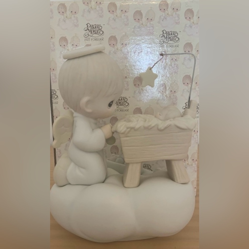 Precious Moments 
He Is The Star In The Morning 
522252
Enesco